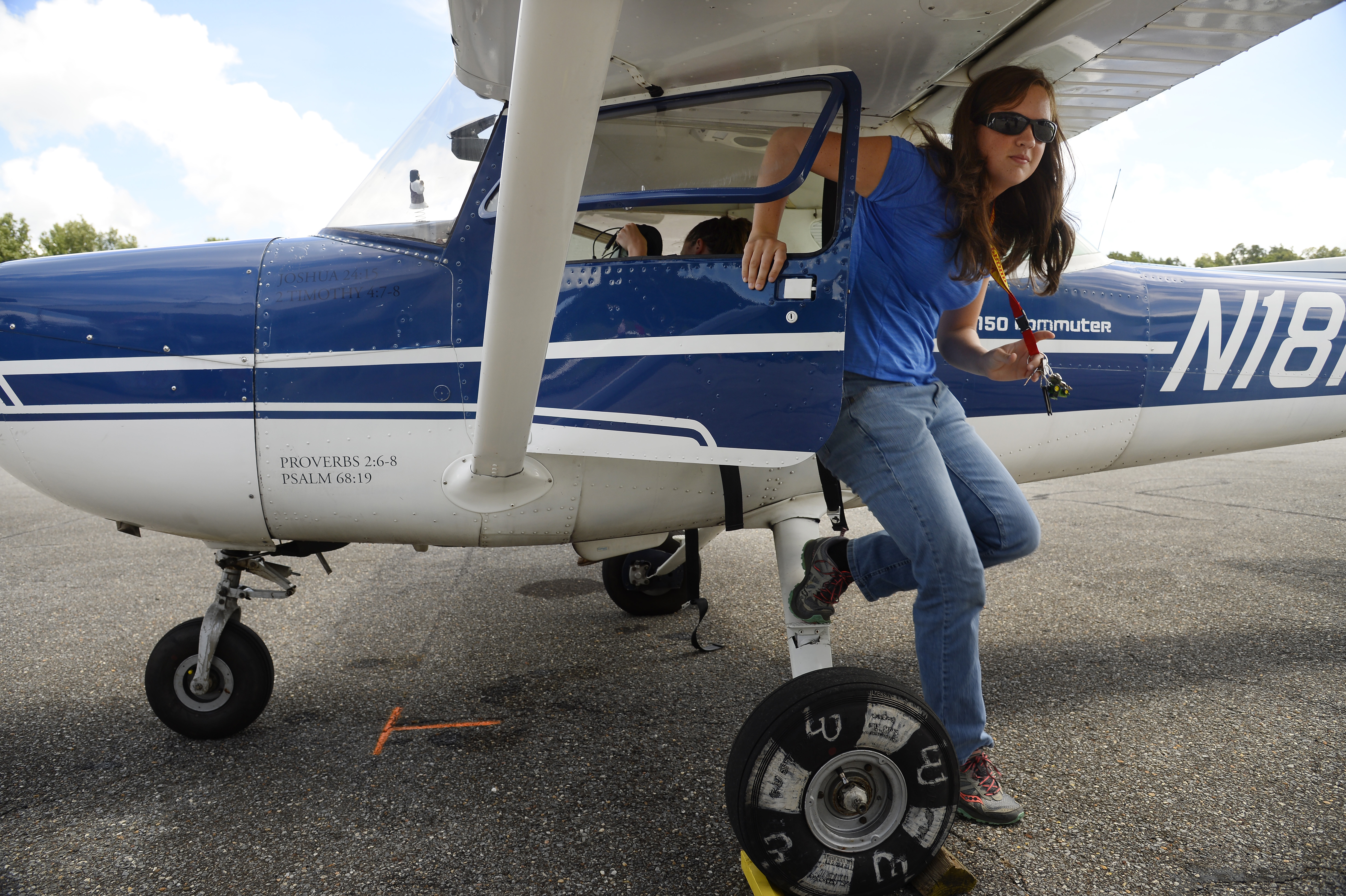 New Horizons Solo Academy student Kasey Boyer exits a Cessna 150 after performing takeoffs and landings with an instructor.