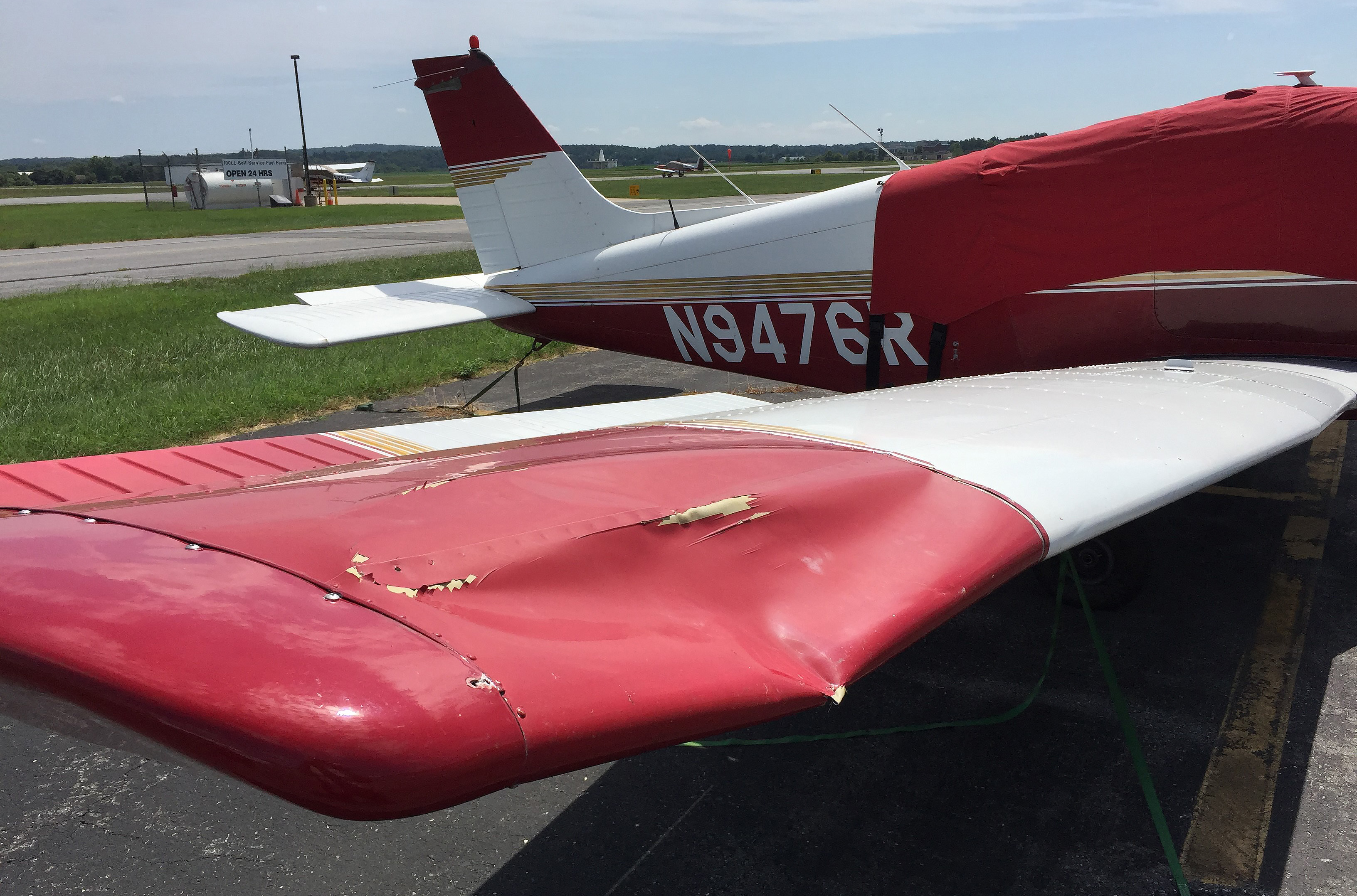 The Octopus Flight Club's Piper Warrior shows damage from a bird strike encountered by pilot Ali Kaan Ozdemir and Ambra Xhepa before an emergency descent into Frederick Municipal Airport in Frederick, Maryland. Photo by David Tulis.
