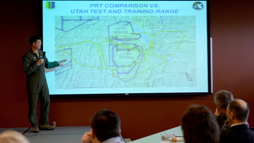 Lt. Col. James Ross, assistant operations officer assigned to the 28th Operations Support Squadron, presents information on the Powder River Training Complex during the inaugural Powder River Council meeting in the deployment center at Ellsworth Air Force Base, S.D., Nov. 16, 2016. During the meeting, PRC members discussed issues for mutual understanding including radar coverage, air traffic control assistance, large force exercises and near-miss incidents. (U.S. Air Force Photo by Senior Airman Rebecca Imwalle)