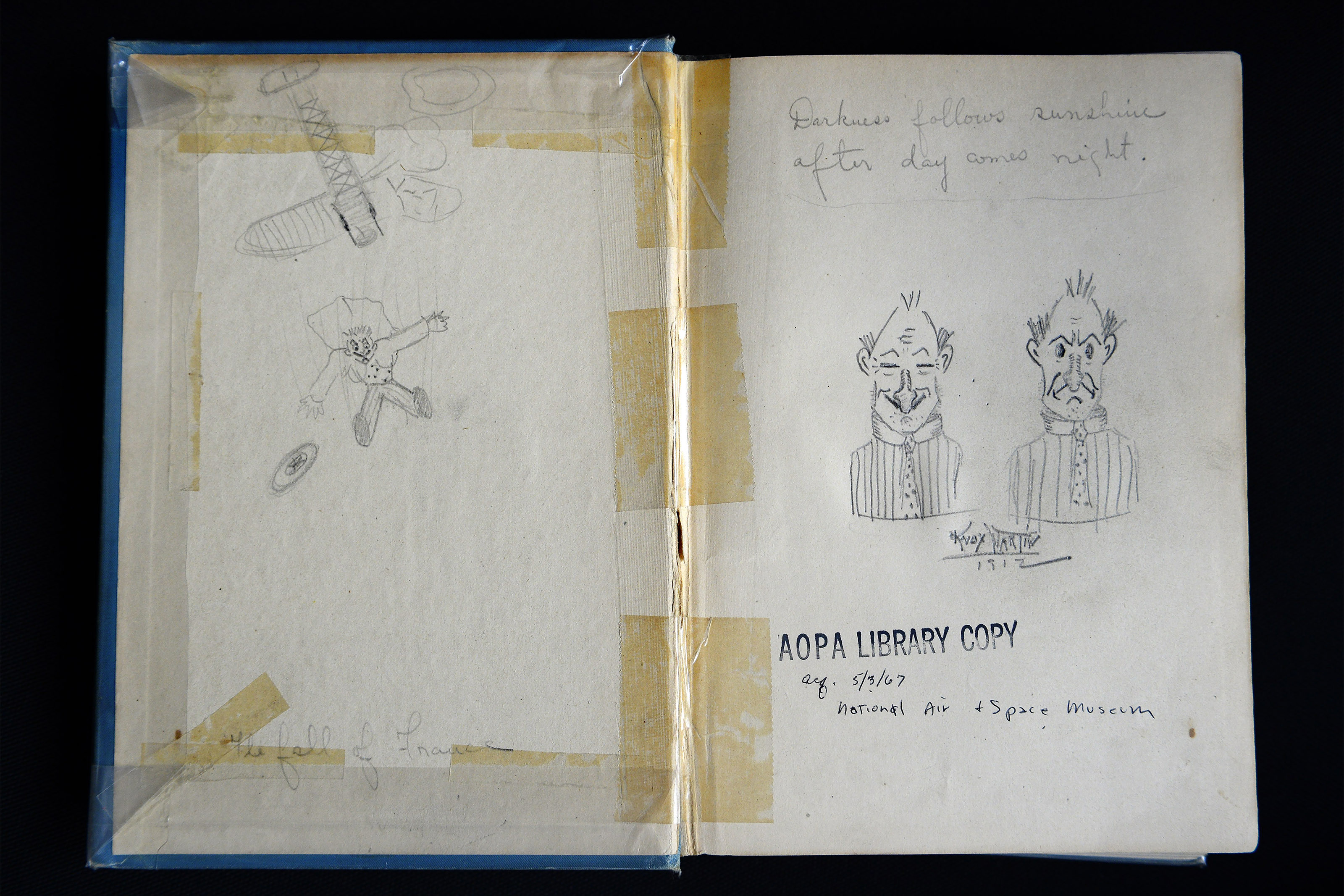 Aviation pioneer Knox Martin, who established air routes in South America during the 1910s and 1920s, had doodled in a long lost book that was delivered to his son, artist Knox Martin, by AOPA's Dave Hirschman, Dec. 4. Photo by David Tulis.