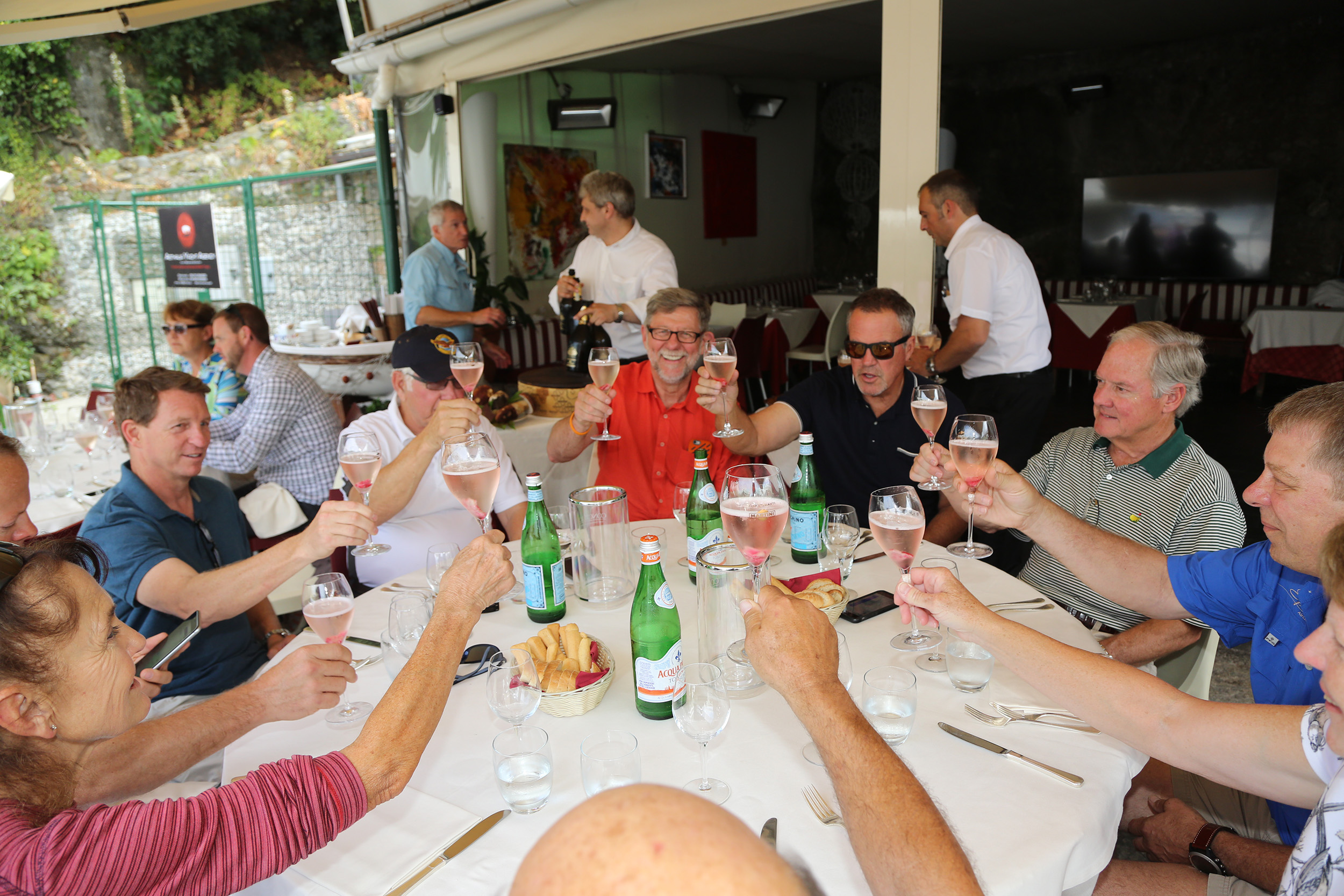The Epic voyagers toast their arrival in Italy. Photo by Jean-Marie Urlacher, courtesy of Epic Aircraft.