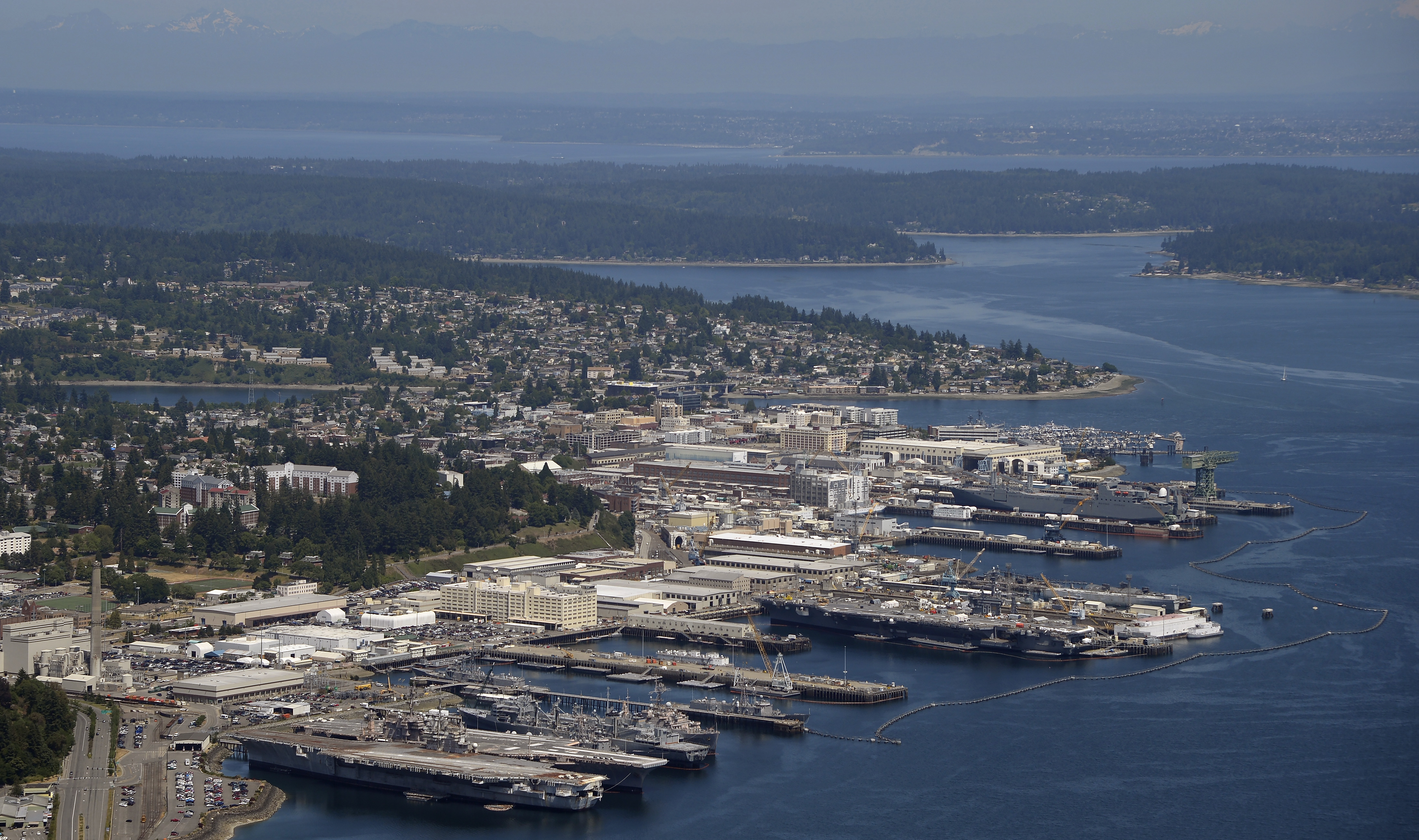 Naval Base Kitsap and the Port of Bremerton are seen in this aerial photo. A special tour of the 'USS John C. Stennis' is available for AOPA Fly-In at Bremerton, Washington, attendees. Photo by David Tulis.