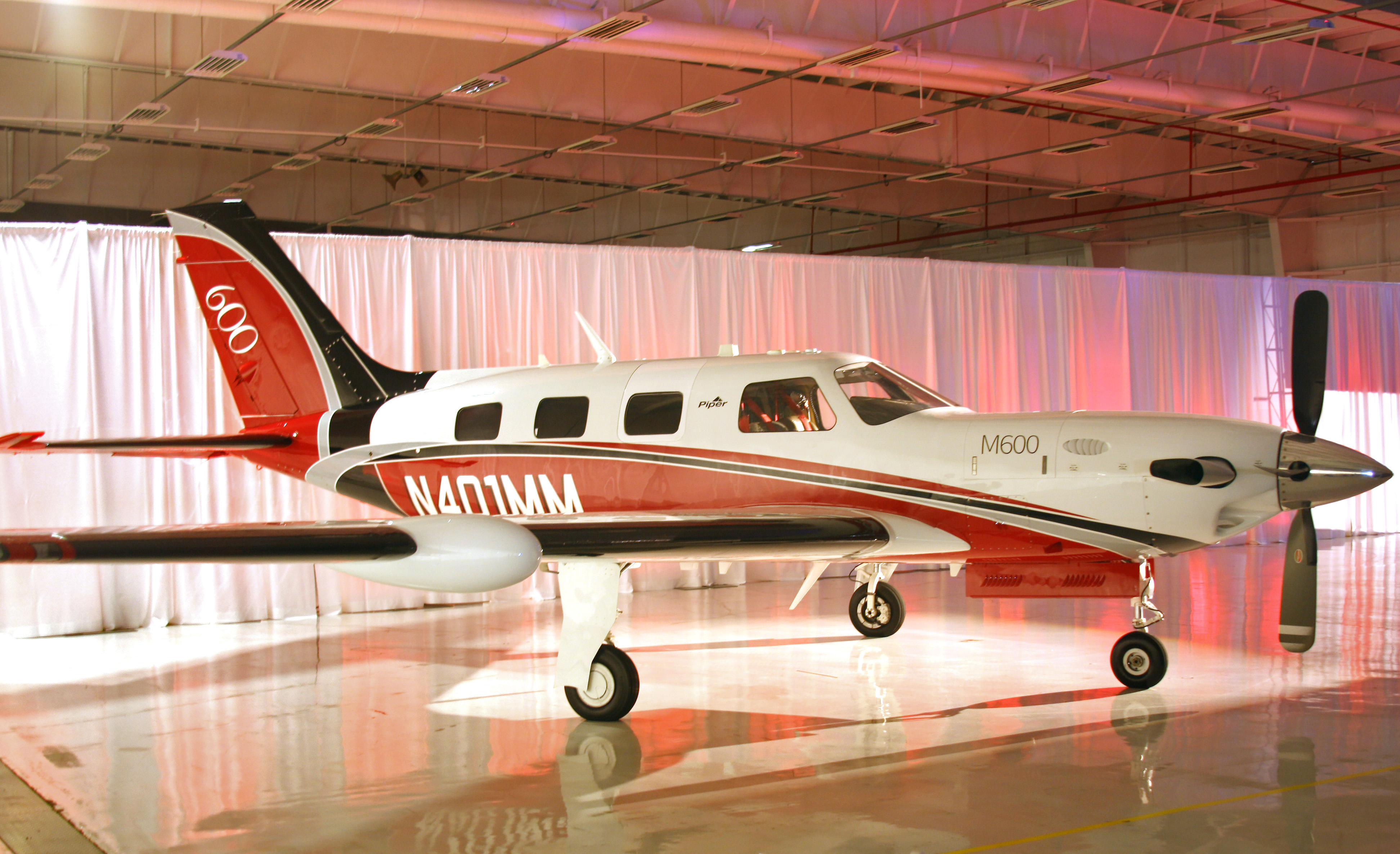 A Piper Aircraft M600 is displayed during a type certification celebration at the company's Vero Beach, Florida, facility. Photo by Jamie Beckett.