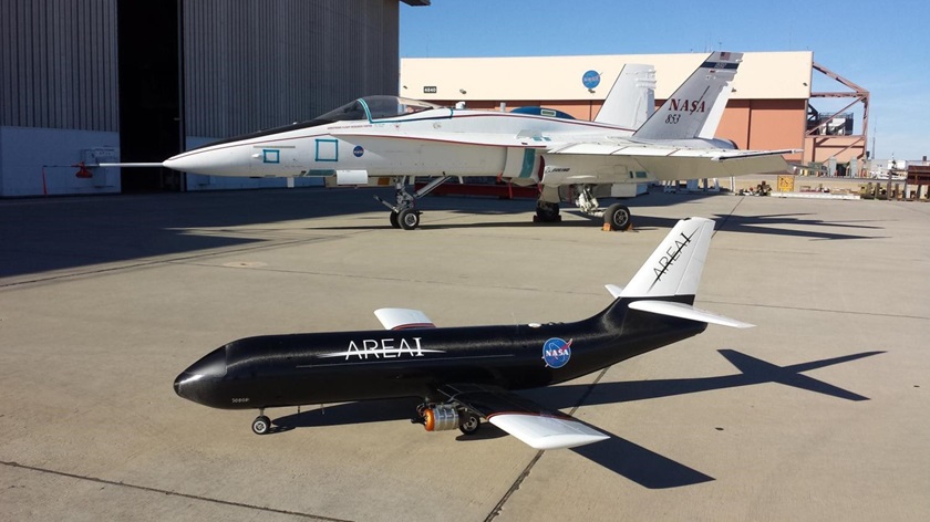 The PTERA test aircraft, foreground, will be used to test the bending wing concept in flight. NASA photo.