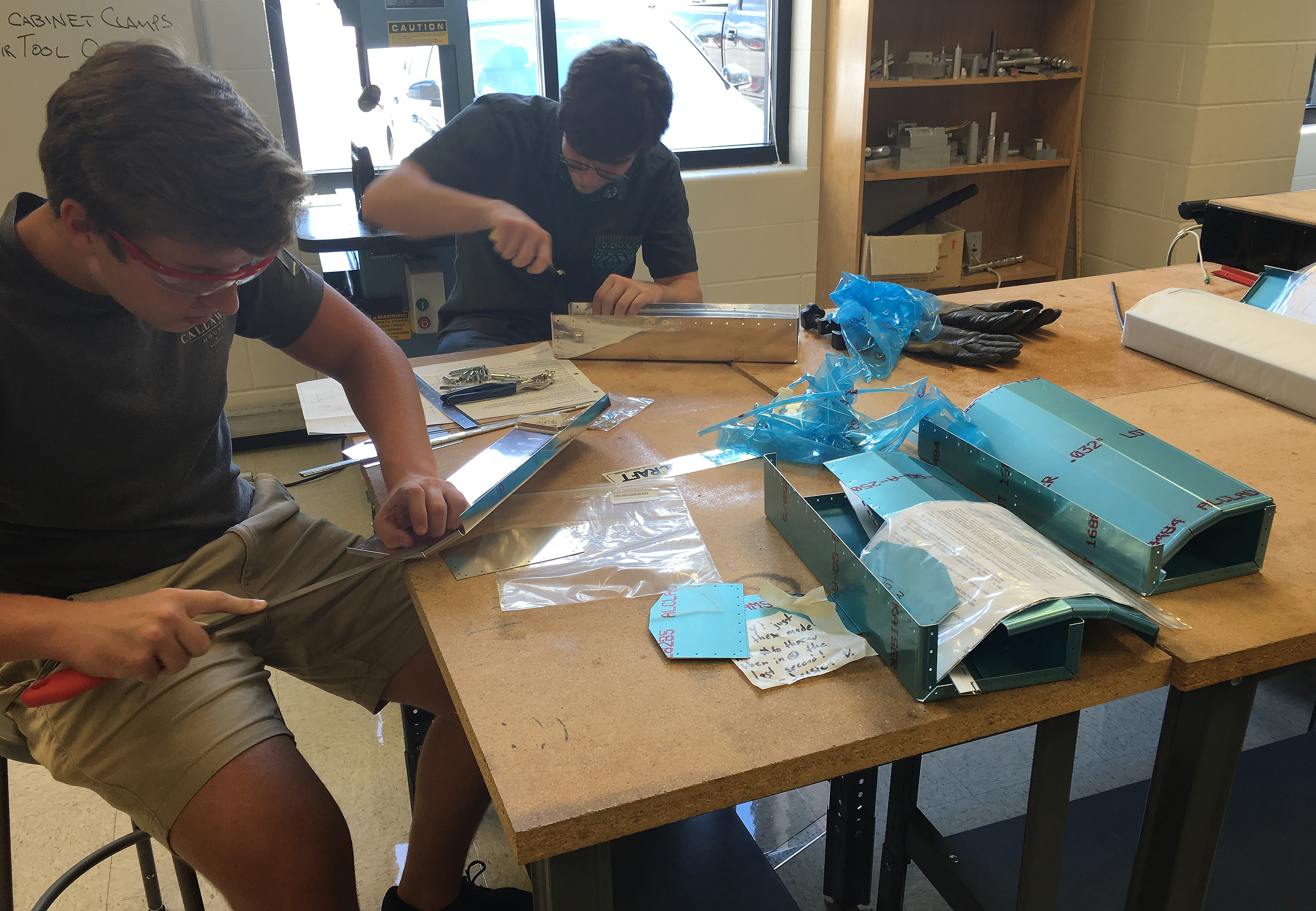 Georgetown, Texas, science, technology, engineering, and math students work on Van's Aircraft RV-12 parts for their airplane build project supervised by engineering teacher Dan Weyant. Photo courtesy of Dan Weyant.