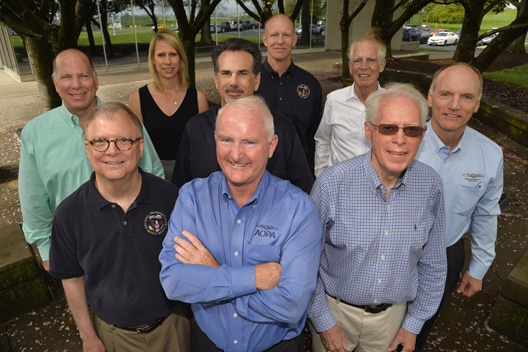 The NTSB’s Robert Sumwalt, Earl Weener, John DeLisi, and Tim LeBaron visit with AOPA’s Mark Baker, Richard McSpadden, Ken Mead, Jim Coon, Katie Pribyl, Tom Haines, and other AOPA staff April 21, 2017, in Frederick, Maryland. Photo by David Tulis.
