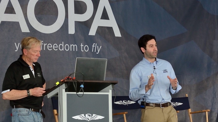 Gary Crump, left, AOPA's director of medical certification, and Jared Allen--an attorney for the AOPA Legal Services Plan--discuss the new BasicMed rules at Sun 'n Fun 2017. Photo by Mike Collins.