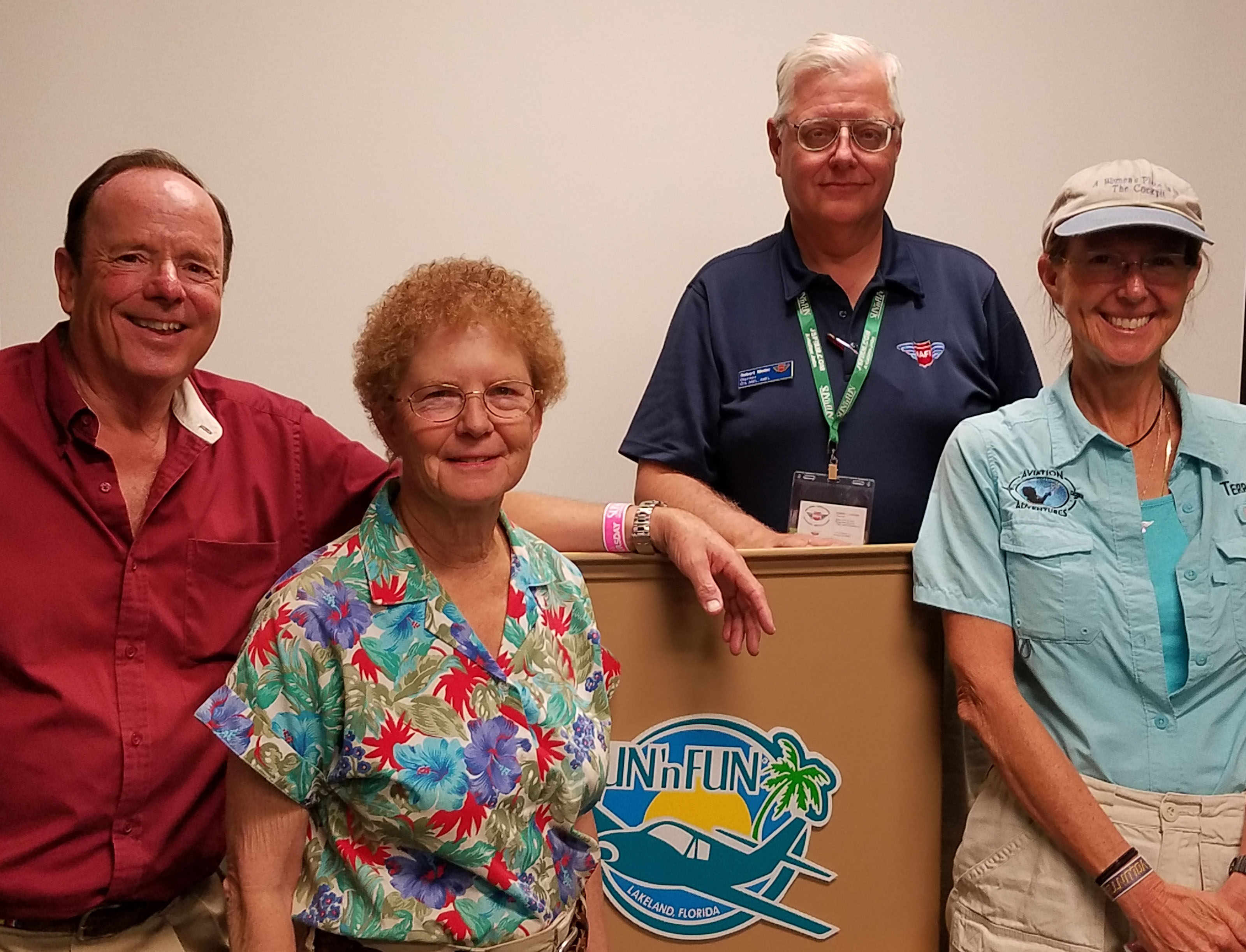 Left to right: John King, Martha King, Robert Meder, and Terry Carbonell. Carbonell, a flight instructor who helps teach youth about aviation, was awarded the first NAFI/King Schools scholarship April 6.