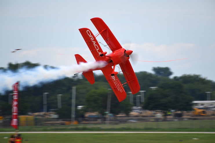 Sean D. Tucker performs his signature triple ribbon cut during EAA AirVenture at Wittman Regional Airport in Oshkosh, Wisconsin. Photo by David Tulis.