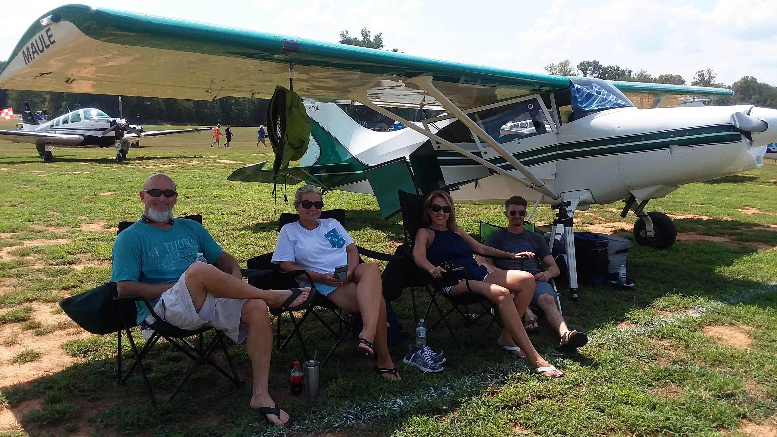 Wayne and Cheryl Sherrill (left) get a taste of relaxing at Triple Tree Aerodrome after flying in with their neighbors Nicol and Casey Matthews in a Maule. 