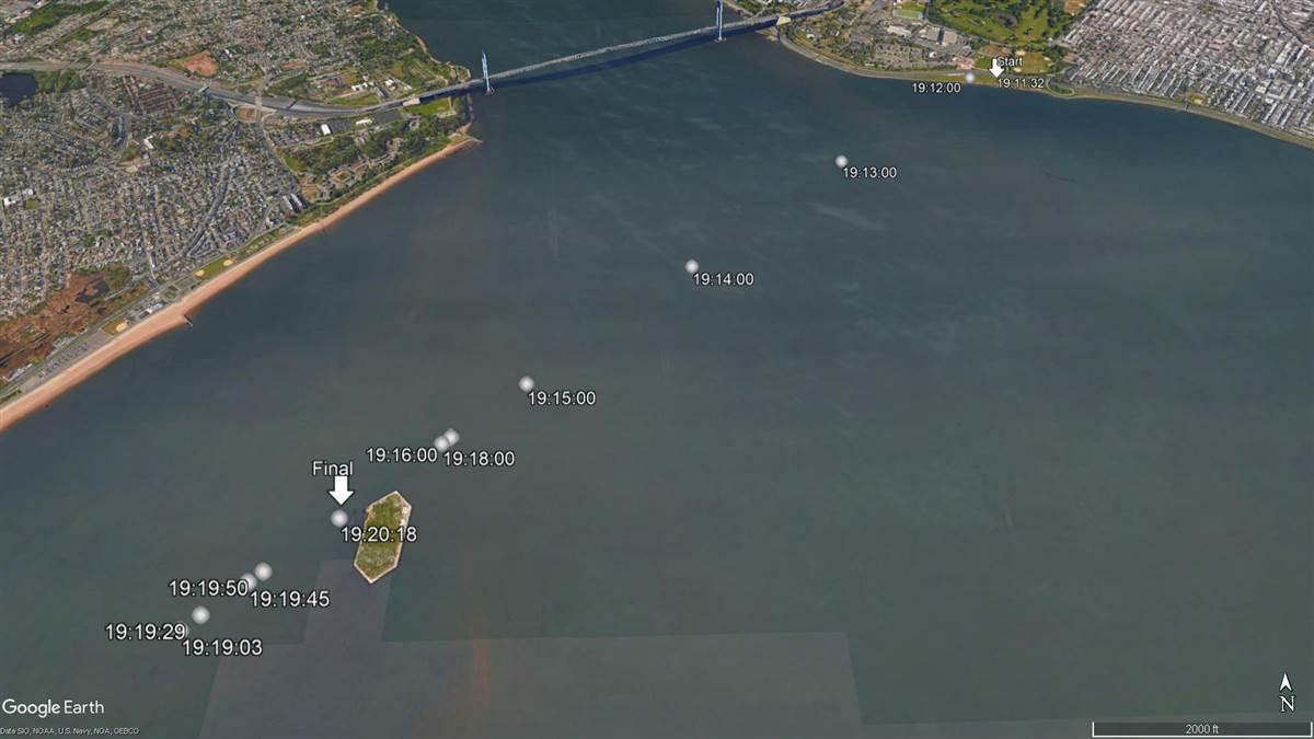 This Google Earth image includes overlays of selected GPS data points logged Sept. 21 by the DJI Phantom 4 which collided with a U.S. Army helicopter south of the Verrazano-Narrows Bridge, visible at the top of the image. The data, made public by the NTSB Dec. 13, show the Phantom reached a maximum distance from home of 2.8 miles at 7:19:03 p.m., and transmitted its final data point at 7:20:18, 2.44 miles from the home point. 