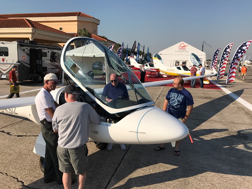 Attendees look over a light sport aircraft during the 2017 U.S. Sport Aviation Expo in Sebring, Florida. Photo by Jamie Beckett.