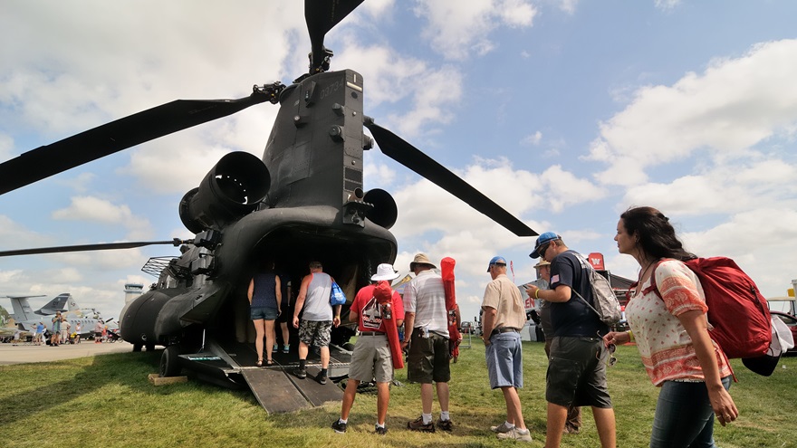 Visitors to EAA AirVenture 2017 line up to walk through a MH-47G heavy assault helicopter operated by the U.S. Army's 160th Special Operations Aviation Regiment--the storied "Night Stalkers." Photo by Mike Collins.