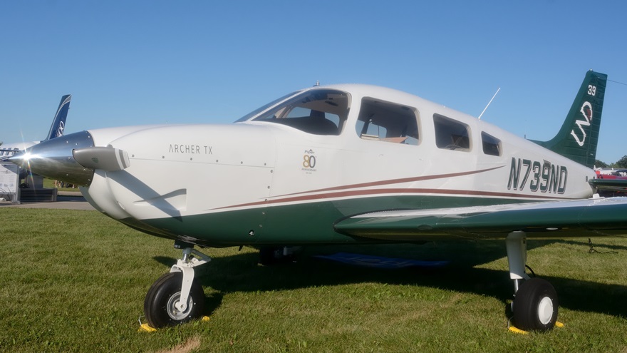 The University of North Dakota operates this Piper Archer TX--an Archer III fitted with a Garmin glass cockpit--displayed by Piper at its EAA AirVenture 2017 exhibit. Photo by Mike Collins.