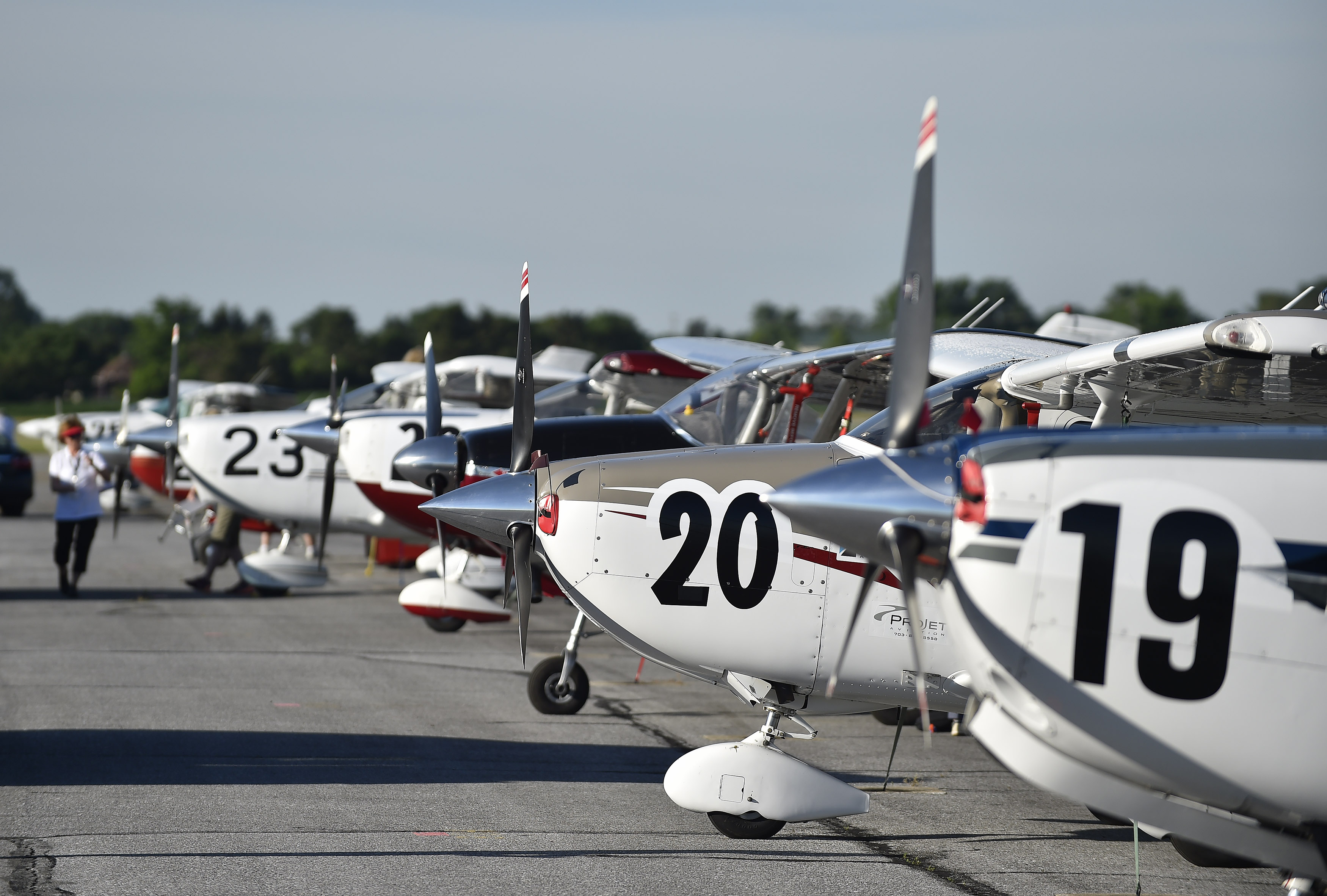 Air Race Classic aircraft are lined up and ready to start the 2017 race from Frederick, Maryland. In 2018, the teams will start in Texas and wind their way through the United States to end in Maine. Photo by David Tulis.
