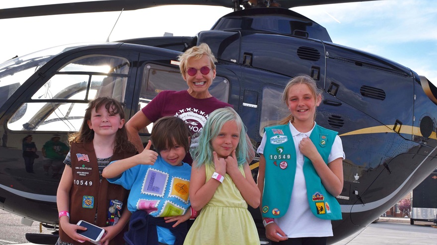 Dianna Stanger with WOAW Fly It Forward Challenge passengers Caroline Whittemore, Lily Pena-Smith, Gretchen O’Donnell, and Mia Hollister with Stanger's EC135 helicopter. Photo courtesy of Jasmine Gordon.