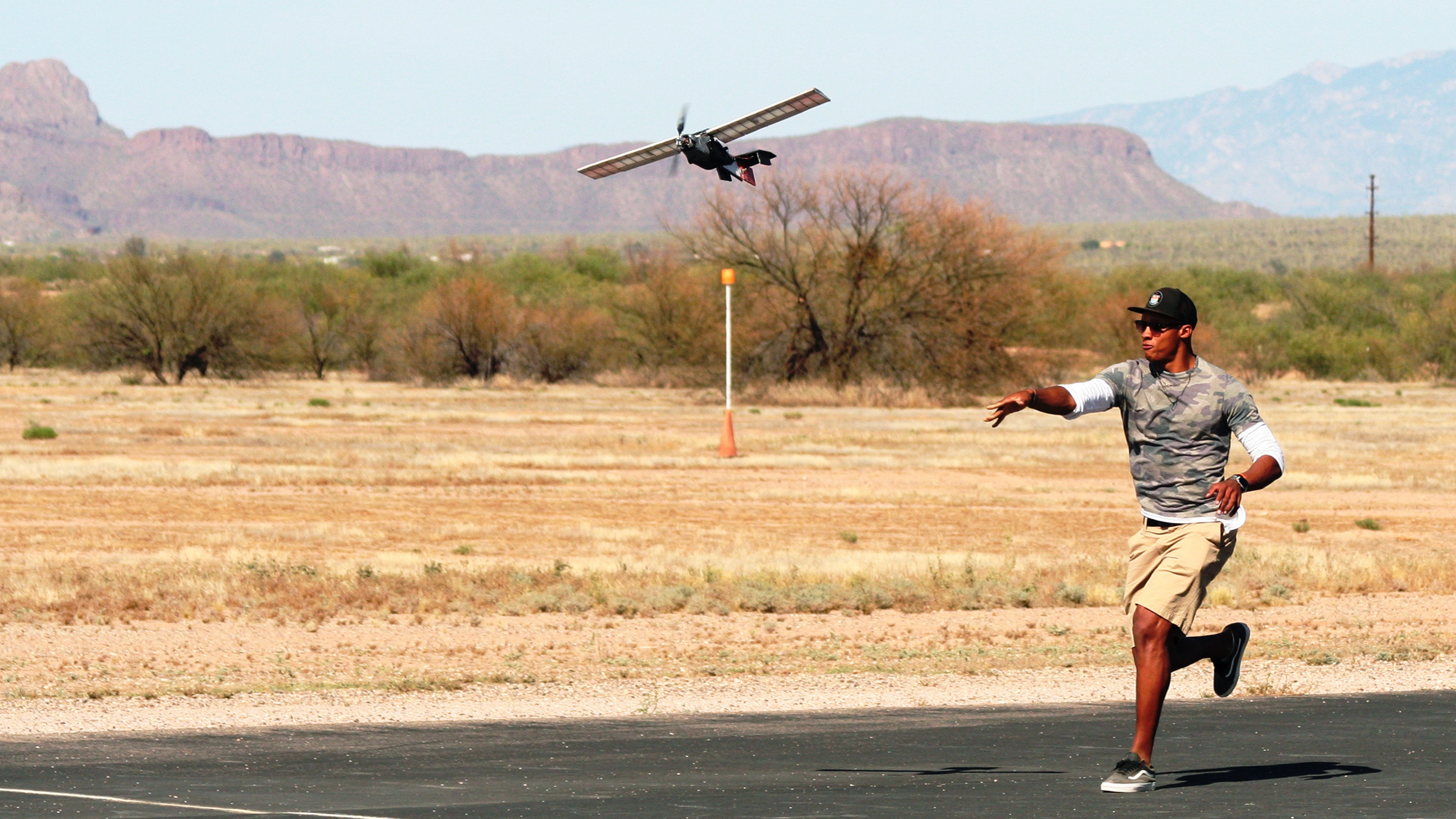 Former University of Tennessee quarterback Joshua Dobbs gives his team's model aircraft a running start in the Design/Build/Fly American Institute of Aeronautics and Astronautics (AIAA) competition in Tucson, Arizona. Photo courtesy of David Reynolds.