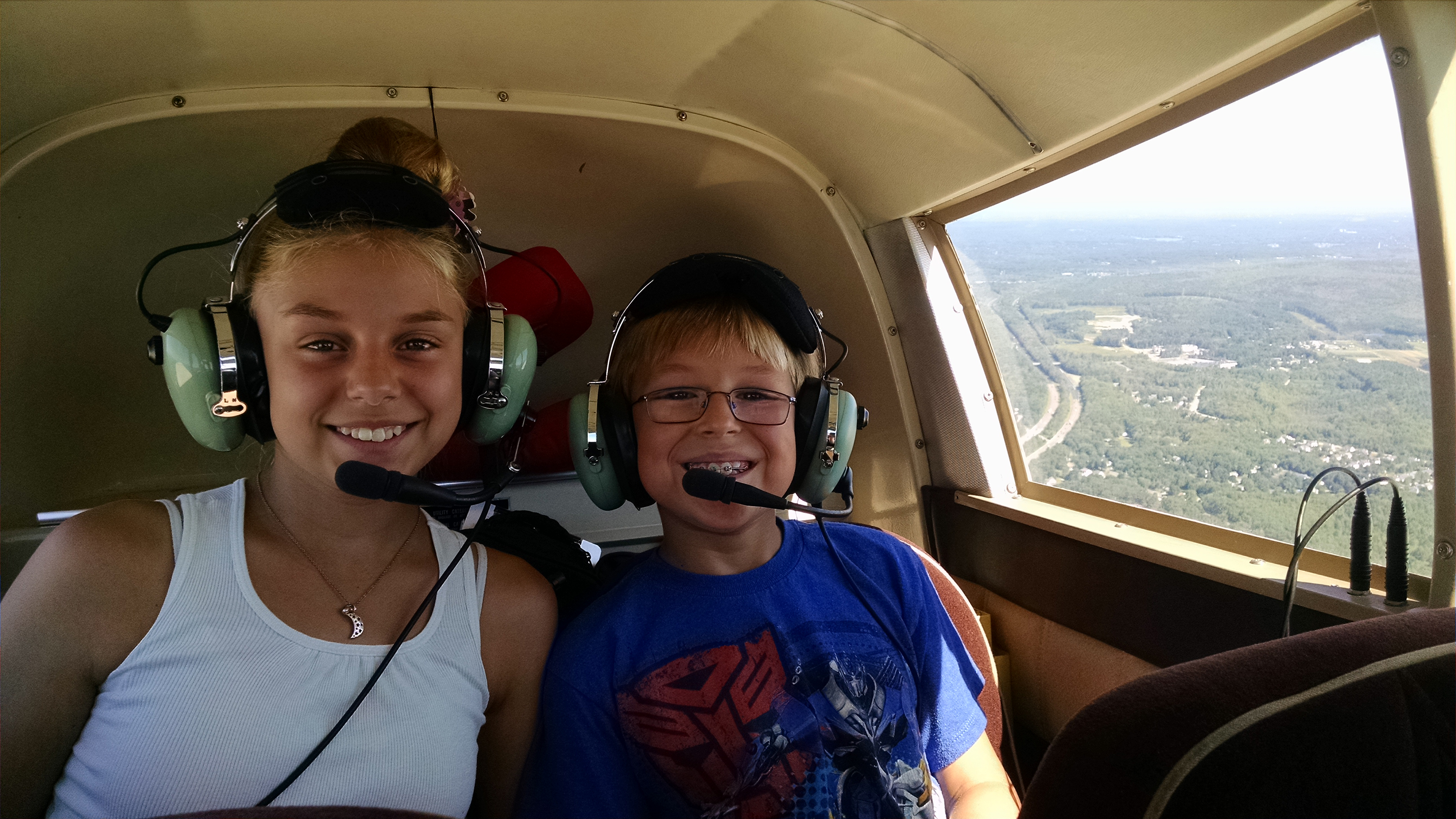Samantha Duarte, 12, and Nathan Duarte, 9, enjoy a flight. Photo courtesy of Bryan Duarte.