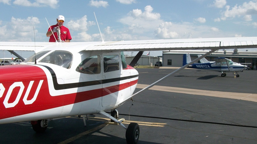 Stephen Vale refuels a locally based Cessna Skyhawk at Granbury Regional Airport. Photo courtesy of Peter D. Heffley.