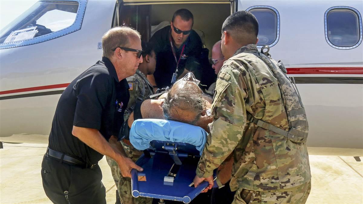 Army Spc. De'Angelica Blocker and Spc. Jose Sotomayor help board a patient during a medical evacuation on St. Thomas, U.S. Virgin Islands, Sept. 24, 2017. Blocker and Sotomayor are medics assigned to the 602nd Area Support Medical Company, which provided triage, treatments, and care following hurricanes Irma and Maria. Army photo by Pvt. Alleea Oliver.