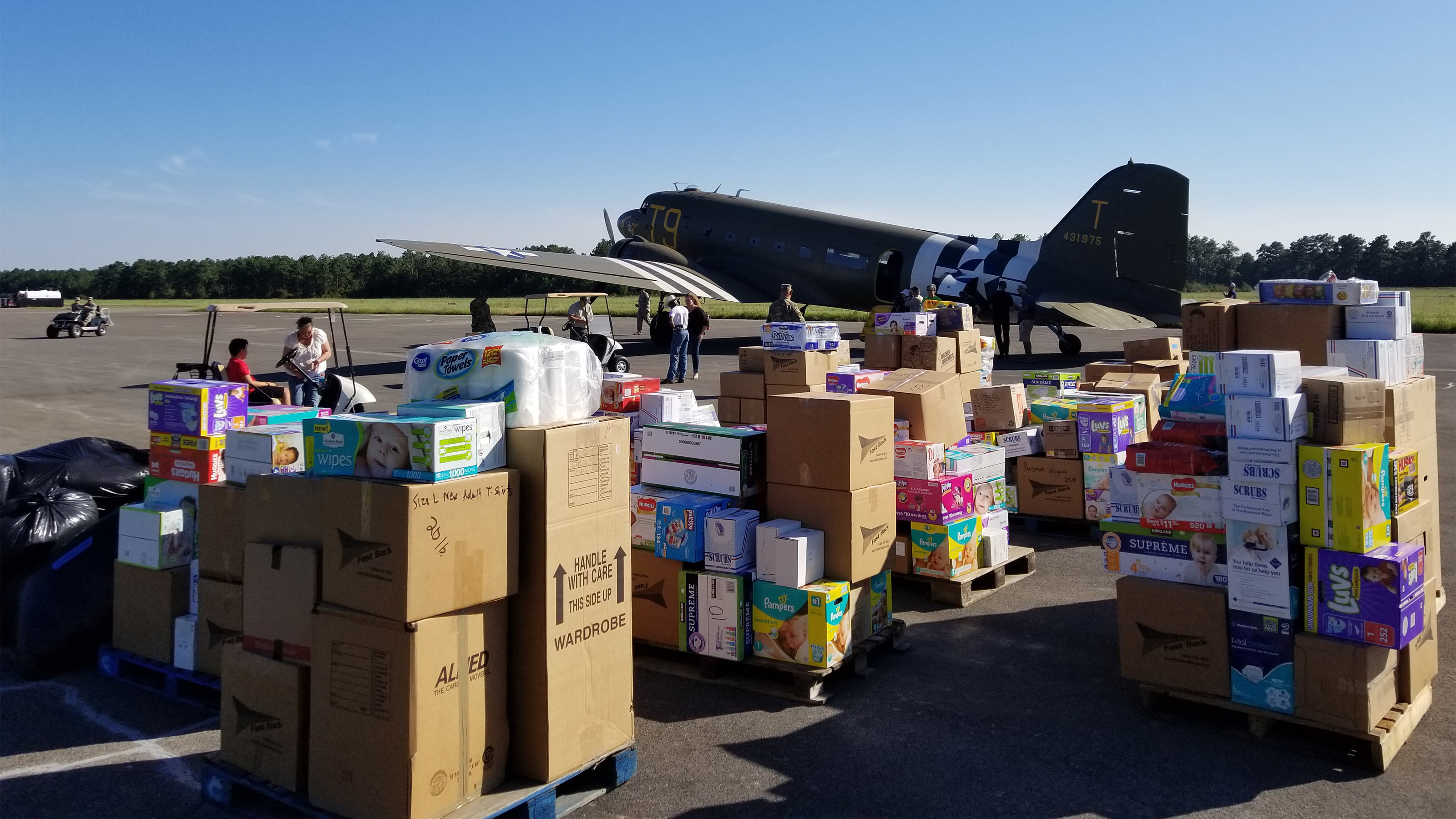 Members of the Texas Army National Guard 3rd Battalion, 141st Infantry regiment coordinate aircraft and distribution of supplies to the local area surrounding Hawthorne Field Airport (45R) in Kountze, Texas. Photo courtesy of Sgt. Eric Madore.