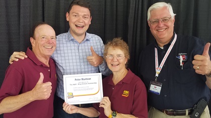 From left, John King, Pete Muntean, Martha King, and National Association of Flight Instructors Chairman Robert Meder during the scholarship presentation. Photo by Mike Collins. 