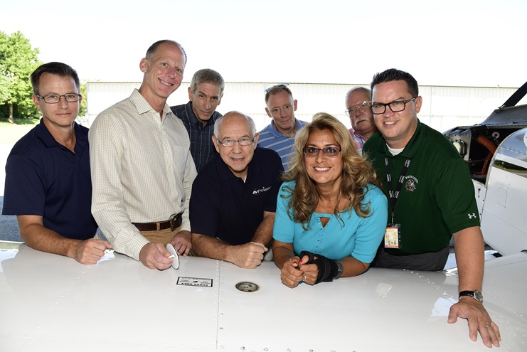 Members of the Piston Aviation Fuels Initiative Steering Group which consists of the FAA, AOPA, EAA, GAMA, NBAA, and NATA, gather for a portrait during a meeting at AOPA headquarters at the Frederick Municipal Airport, in Frederick, Maryland, Aug. 30, 2018. The members are, from L-R: Jeff Warner, Peter White, Mark Rumizen, Ron Wilkinson, Pete Rouse, Monica Merritt, Kevin Brane, and AOPA Senior Director of Regulatory Affairs David Oord. Photo by David Tulis. 
