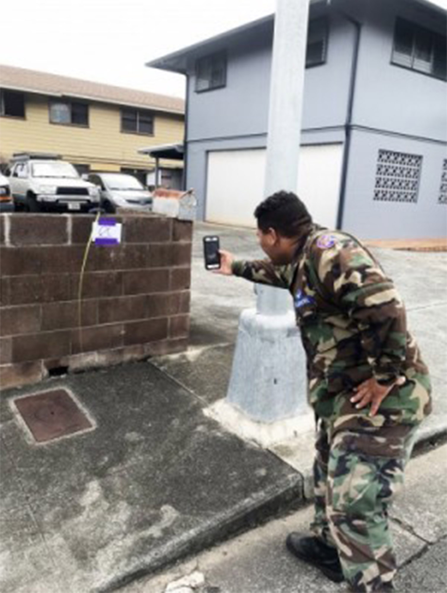 Civil Air Patrol members in Hawaii were directed to collect data with their cell phones to help provide more accurate Hurricane Lane damage reports to the Federal Emergency Management Agency, Aug. 28, 2018. Second Lt. Kamalama Kaikuana, the Hawaii Wing’s assistant director of communications, tries out the FEMA app he downloaded to his phone on the island of Oahu. Photo courtesy of the Civil Air Patrol.