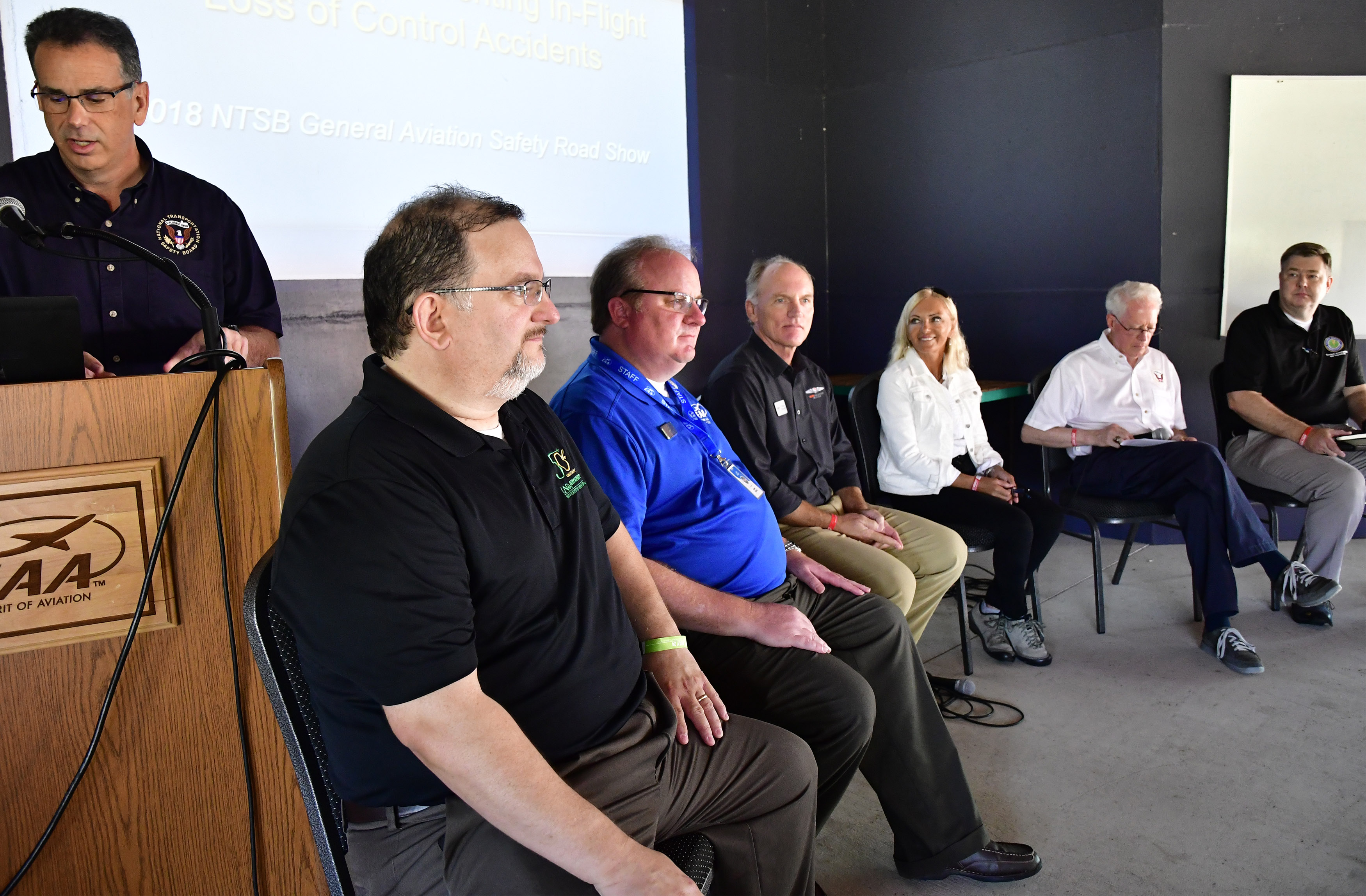 An NTSB Safety Road Show presentation on preventing in-flight loss of control included aerobatic champion Patty Wagstaff and AOPA Air Safety Institute director Richard McSpadden, center, during EAA AirVenture in Oshkosh, Wisconsin, July 24, 2018. Photo by David Tulis.