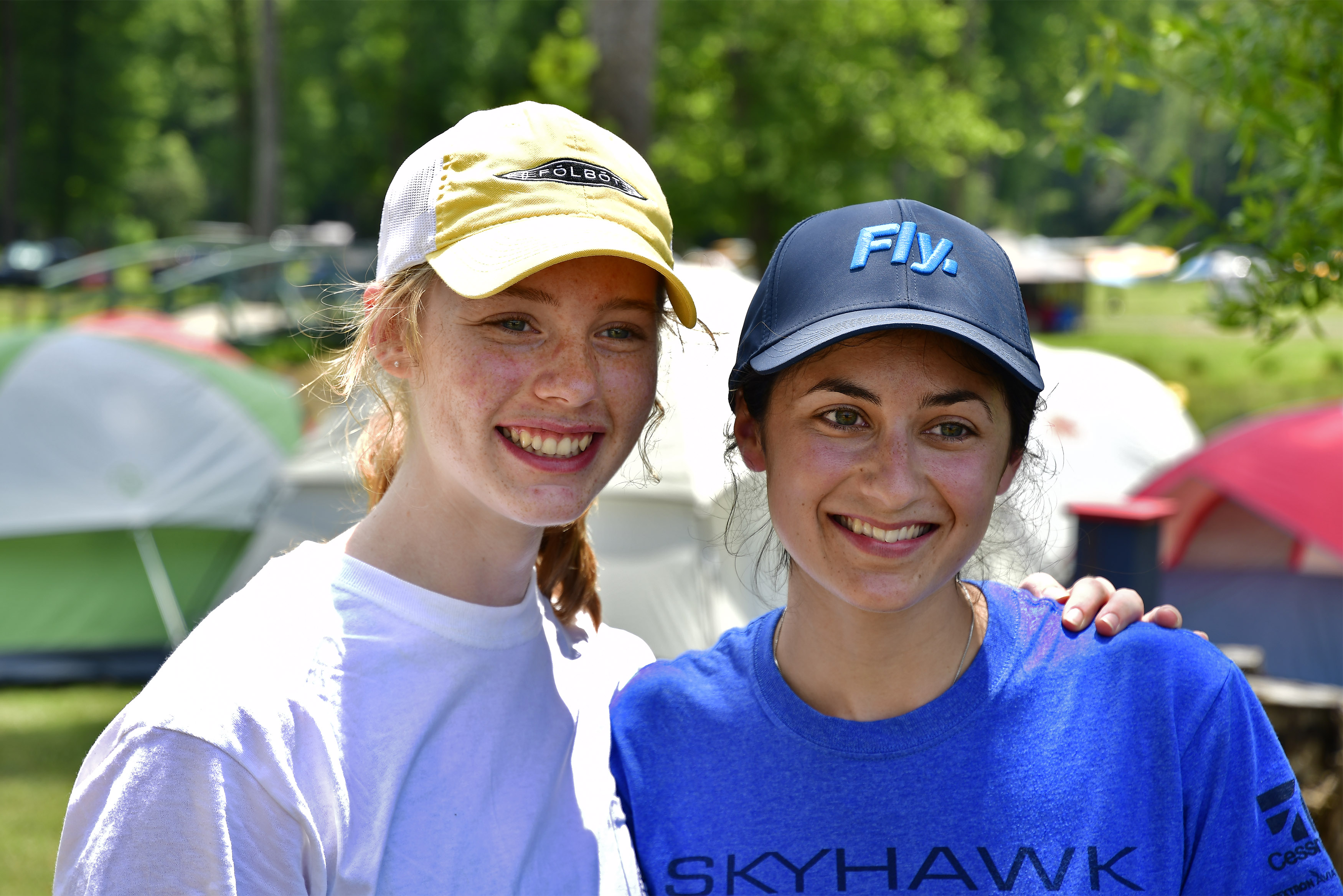 Rachel Enggasser and Malena Modirzadeh volunteered during the Young Aviators Fly-In at Triple Tree Aerodrome in Woodruff, South Carolina, June 8 to 10. Photo by David Tulis.