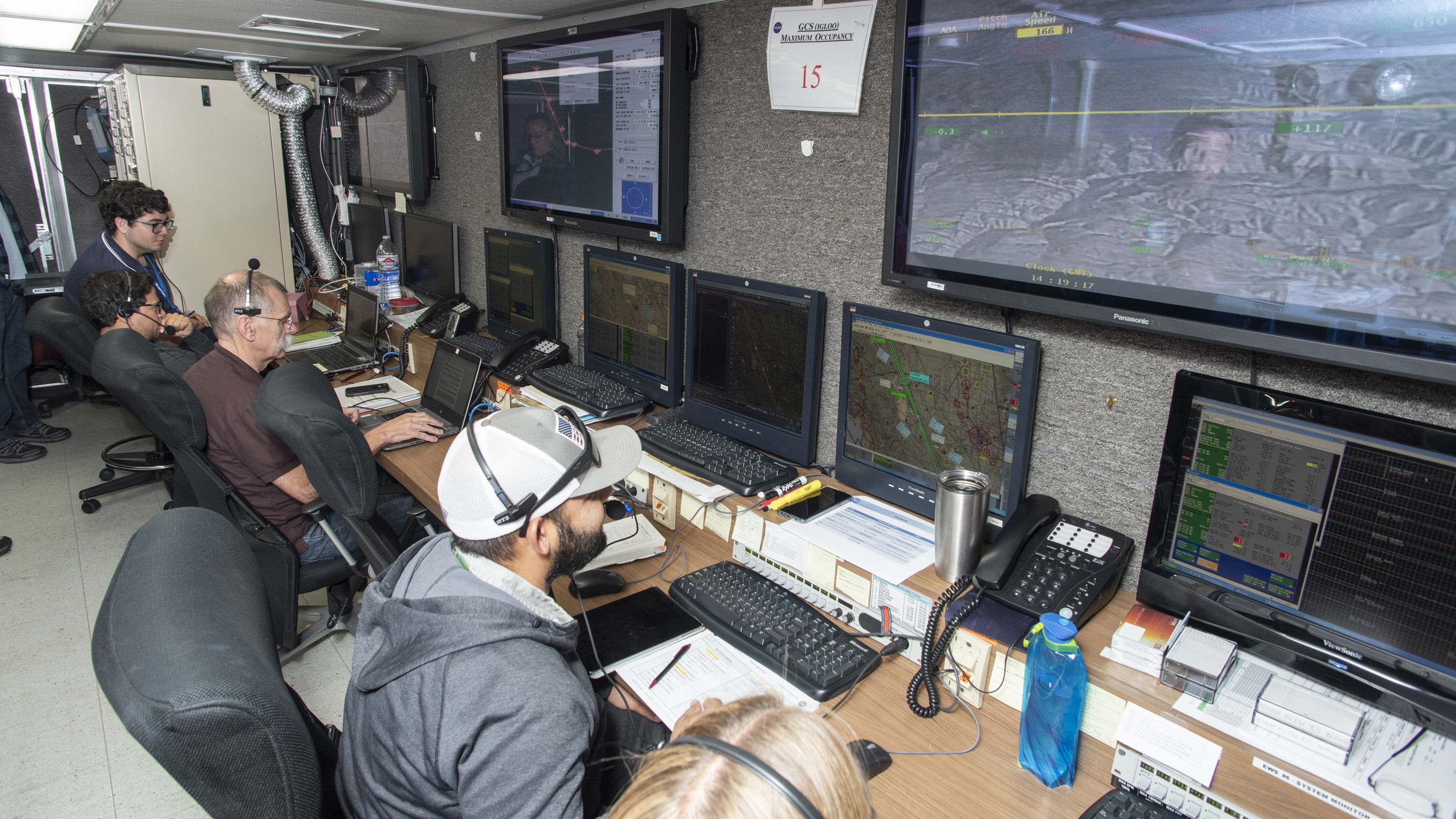 Engineers at the NASA Armstrong Flight Research Center monitor the remotely piloted Ikhana aircraft from a mission control room during a test flight June 12. NASA photo by Ken Ulbrich.