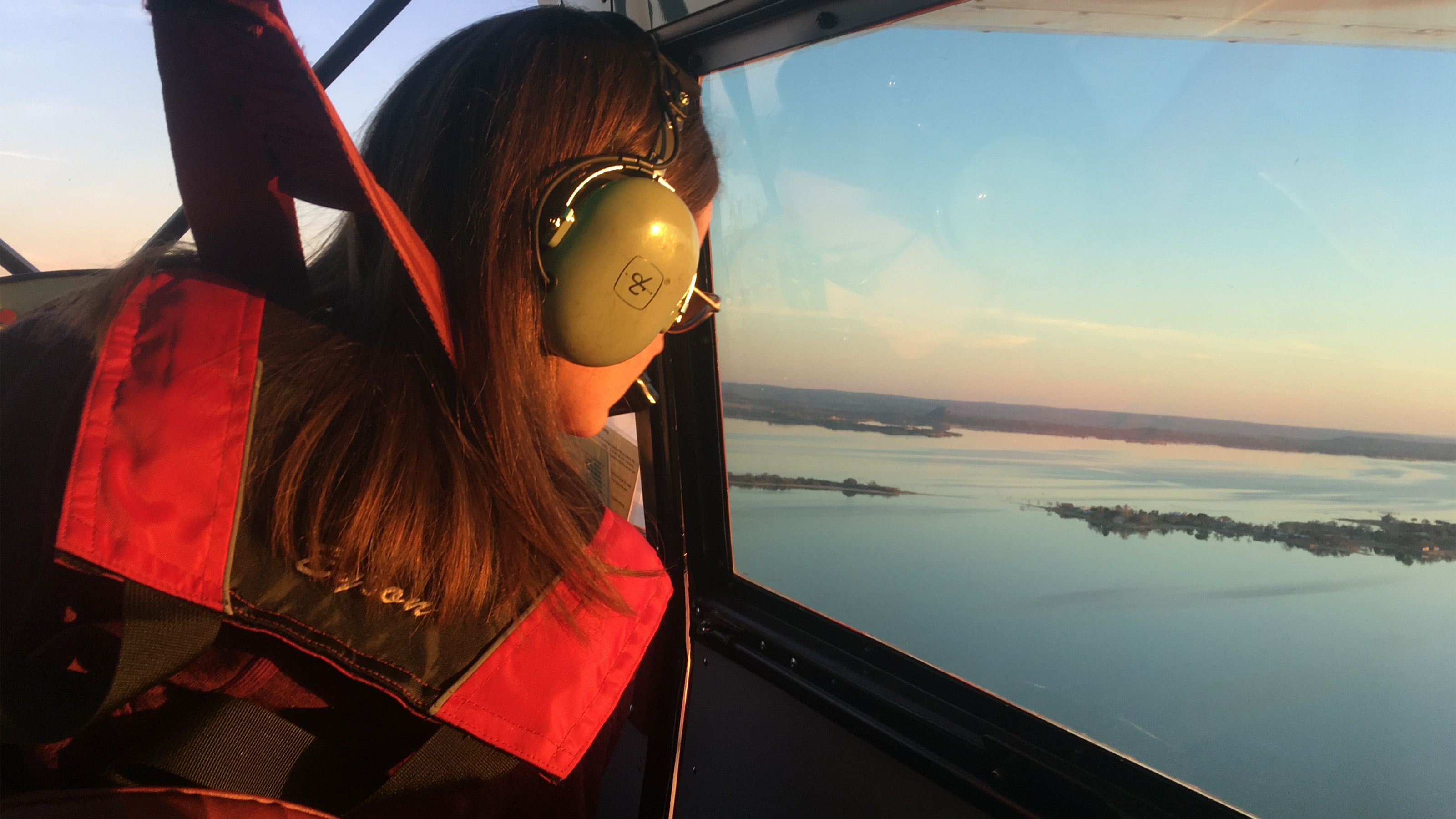 Alyssa Cobb flies over Lake Buchanan before sunset after a full day of seaplane training. What a beautiful way to end the day before docking at Canyon of the Eagles Resort! Photo by Tres Clinton.
