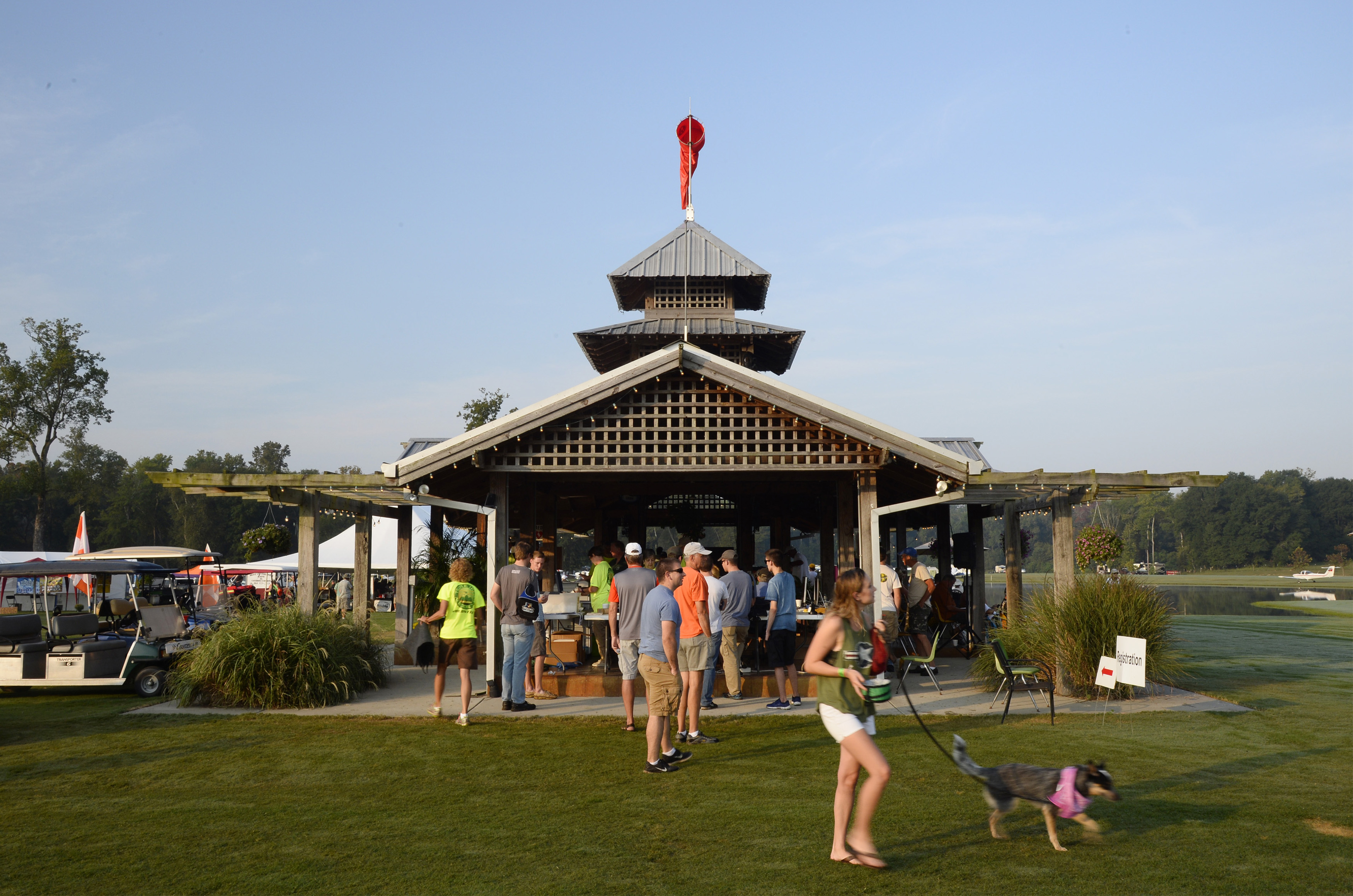 Triple Tree Aerodrome's main gazebo is a gathering spot for aviators informally judging fellow pilots on their landings at the turf strip during a fly-in and campout in South Carolina. Photo by David Tulis.         