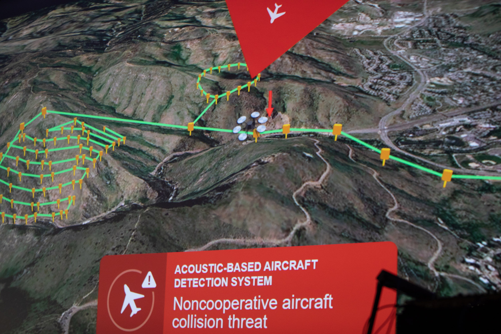PrecisionHawk illustrated its acoustic detection system with this graphic showing an aircraft approaching a drone, which will automatically land if there is a collision threat.
