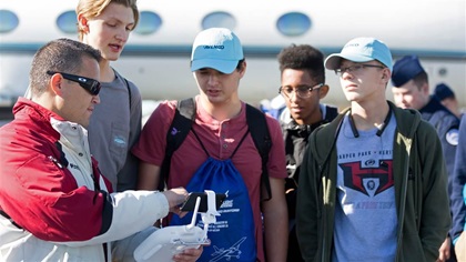 Students learn about drones during the annual Aviation Education and Career Expo at Leesburg Executive Airport in Virginia. Photo courtesy of Alimond Photography, PropJet Aviation.