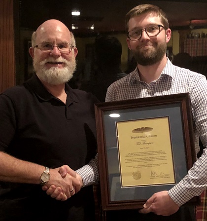 Thompson receives AOPA's Presidential Citation from AOPA Senior Director of Airspace and Air Traffic Rune Duke. Photo courtesy of Rune Duke.