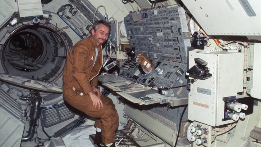 Scientist-astronaut Owen K. Garriott aboard the Skylab 3 mission is stationed at the Apollo Telescope Mount console during Earth orbit. From this console the astronauts actively controlled the solar physics telescope. Photo courtesy of NASA.