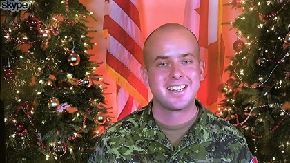 Maj. Andrew Hennessy of the Canadian Army reveals NORAD Santa secrets. Photo by David Tulis.