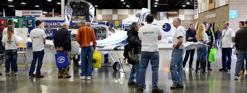 Attendees mingle around vendors and static displays. Photo courtesy of Washington Aviation Association.