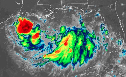 This image from the NOAA GOES satellite shows a band of precipitation from Tropical Storm Barry forming in the Gulf of Mexico. Image courtesy of NOAA.
