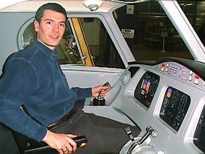 Alsim co-founder founder Jean-Paul Monnin is shown at the controls of an early design. The company is celebrating its twenty-fifth anniversary. Photo courtesy of Alsim.