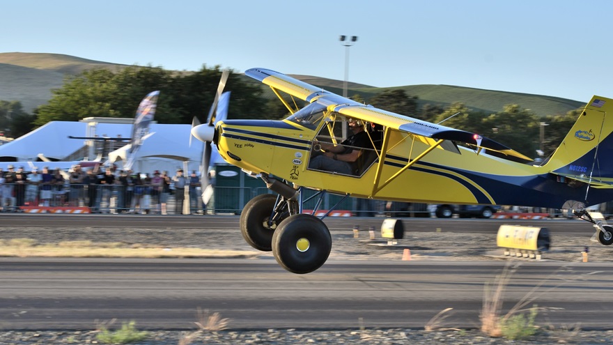 Steve Marlin makes a crosswind landing in his Just Highlander on Friday evening, June 21, during the AOPA STOL Invitational short takeoff and landing demonstration at AOPA's Livermore Fly-In. Photo by Mike Collins.