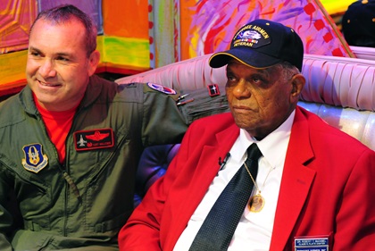 Tuskegee Airman Robert T. McDaniel poses with Col. Kurt Gallegos of the 301st Operations Group during screening of the film 'Red Tails' in 2012. Photo courtesy of Senior Airman Martha Whipple, U.S. Air Force.