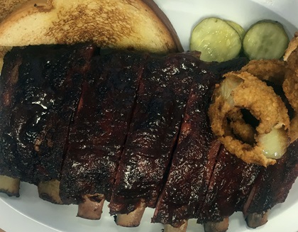 You could eat at a different barbecue joint in Kansas City for three and a half months and never go to the same place. A favorite with multiple locations is Joe’s Kansas City Bar-B-Que, which serves up tasty ribs with a side of onion rings. Photo by MeLinda Schnyder.