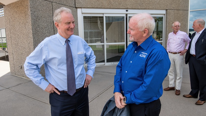 U.S. Sen. Chris Van Hollen (D-Md.), left, talks with AOPA President Mark Baker during a visit to AOPA's headquarters in Frederick, Md. Photo by Mike Collins.