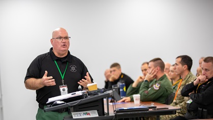 Chief Deputy Leon Bormann of the Albany County Sheriff’s Office delivers a morning safety briefing ahead of the public safety unmanned aircraft fly-in he organized with NUAIR, hosted at the New York State Preparedness Training Center. Photo by Jim Moore.