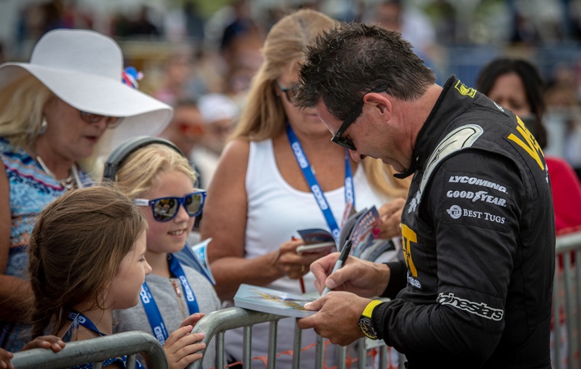 Michael Goulian signs autographs at the New York International Air Show sporting his limited-edition Aplina watch. Photo courtesy of Alpina. 