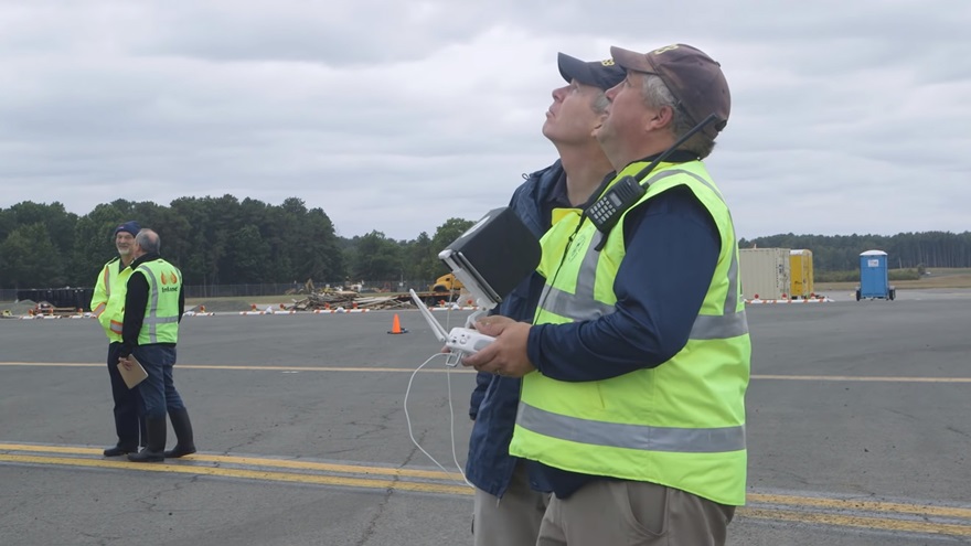 NTSB investigator and drone pilot Mike Bauer flies at the scene of an October 2 crash of a vintage warbird at Bradley International Airport in Connecticut. Photo courtesy of the NTSB via YouTube. 