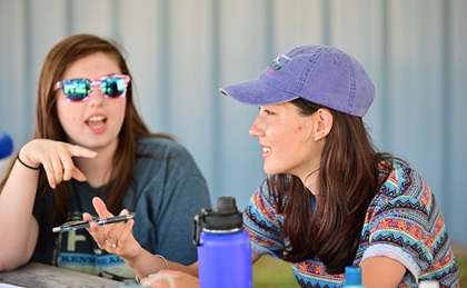 Sonia Talarek of New Jersey, right, who attended the Vermont youth glider camp for her third time, coaches fellow 16-year-old sailplane student Lauren Tulis. Photo by David Tulis.