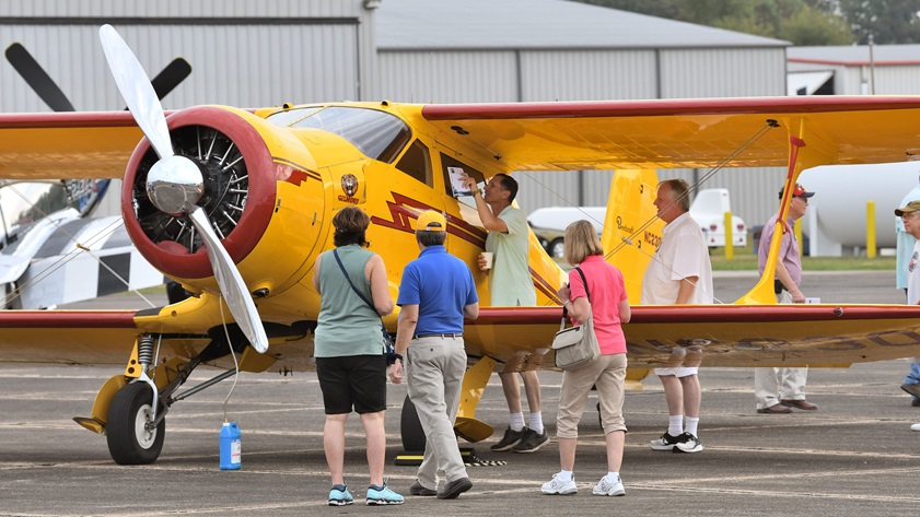 A Beechcraft Model 17 Staggerwing based at Tullahoma Regional Airport sits on the ramp at AOPA's Tullahoma Fly-In. Several others are displayed in the Beechcraft Heritage Museum on the field. Photo by Mike Collins.